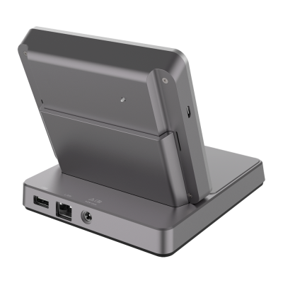 Base de carregamento cinza escuro com portas USB, LAN e entrada de energia.