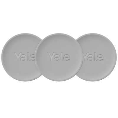 Três tampas redondas cinza claro com o texto 