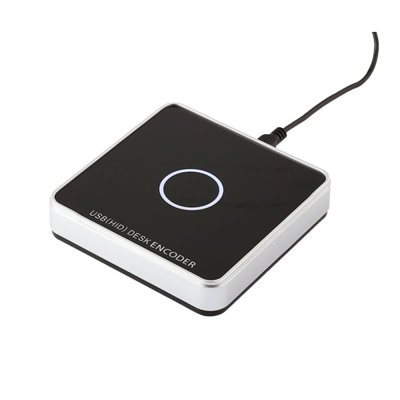 Dispositivo quadrado USB preto brilhante com aro circular iluminado e texto USB(HID) DESK ENCODER