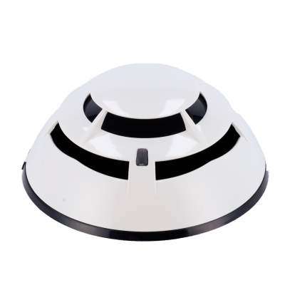 Detector de fumo branco redondo com aberturas pretas
