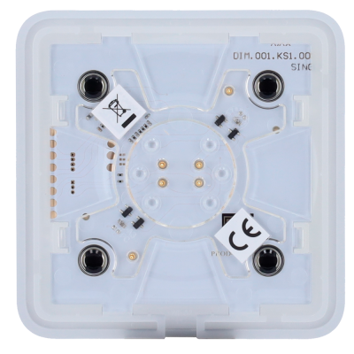 Componente eletrônico quadrado com base branca e tampa transparente com circuitos visíveis