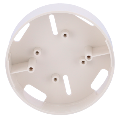 Peça circular branca de plástico com orifícios e rasgos