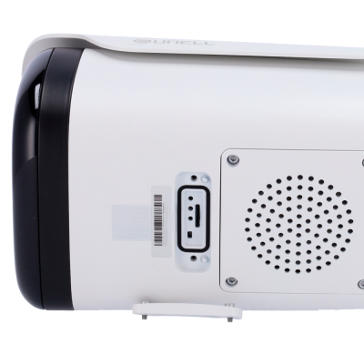 Dispositivo eletrónico branco com extremidade preta e ventilação circular