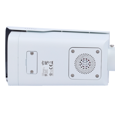 Câmara de segurança branca com ventilação e etiqueta técnica