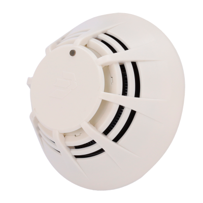 Detector de fumo branco redondo com grelha preta
