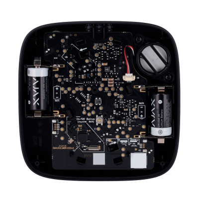Interior de dispositivo eletrônico com placa de circuito e baterias