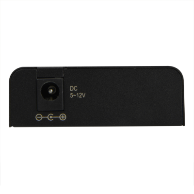 Entrada de alimentação DC de dispositivo eletrónico preto com indicações de voltagem e polaridade.