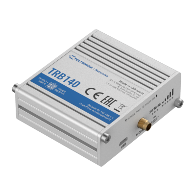 Dispositivo TRB140 da Teltonika Networks em caixa metálica cinzenta com conectores e etiquetas