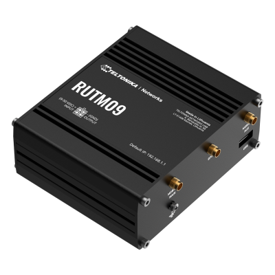 Caixa eletrónica preta com etiquetas brancas e antenas douradas