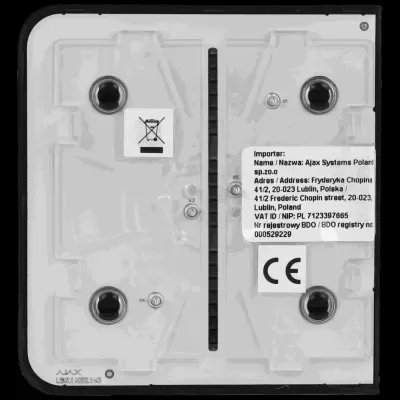 Parte traseira de dispositivo eletrônico cinza com bordas pretas e autocolantes