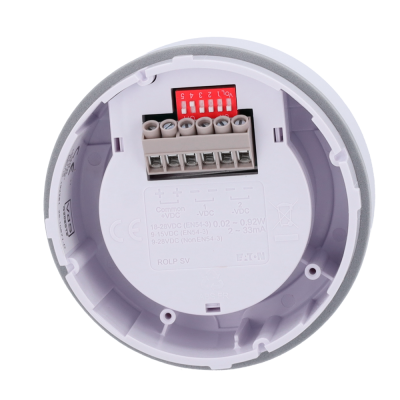 Dispositivo eletrônico redondo branco com conectores e texto na base