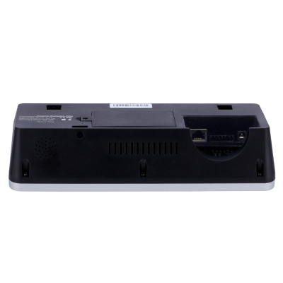 Base de dispositivo eletrónico preto com base branca, entradas e texto técnico