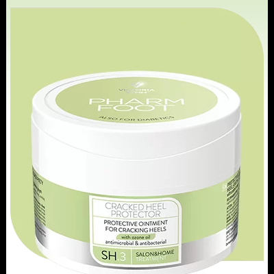 Creme de proteção para calcanhares rachados em embalagem branca com rótulo verde