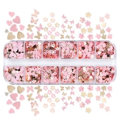 Conjunto de glitter colorido em diferentes formas e cores em recipiente de plástico.