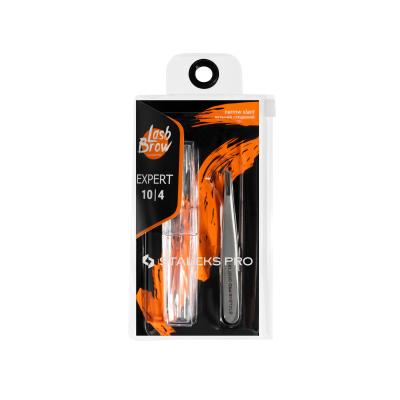 Kit de aplicador e pinça Staleks Pro em embalagem transparente com detalhes laranja e preto