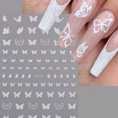 Autocolantes para unhas de borboletas brancas com acabamento glitter e unhas compridas