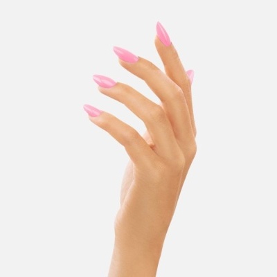 Mão feminina com unhas artifíciais rosa brilhantes