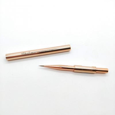 Delineador líquido dourado com aplicador de ponta fina