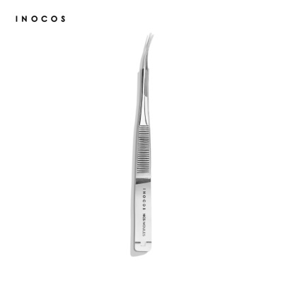 Pinça curva metálica prateada com texto INOCOS
