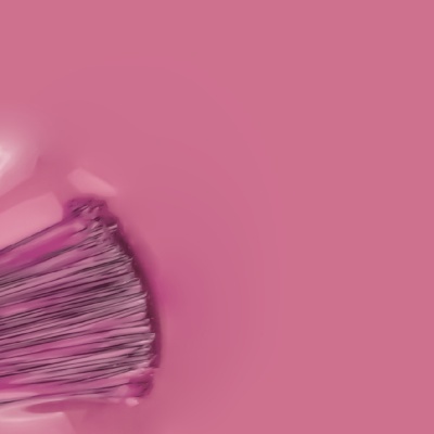 Pincel de maquilhagem roxo sobre fundo rosa