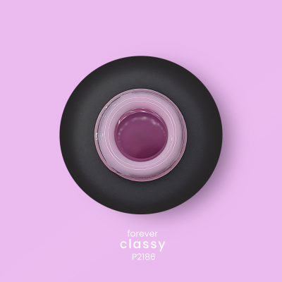 Frasco de verniz roxo com tampa preta em fundo lilás