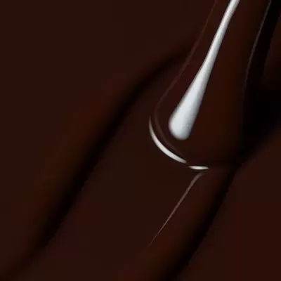 Chocolate derretido com espátula metálica