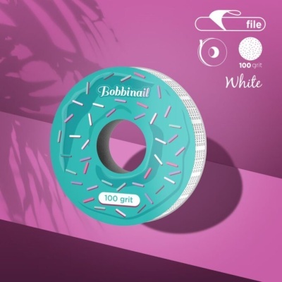 Lima de unha redonda azul-turquesa em formato de donut com salpicos coloridos