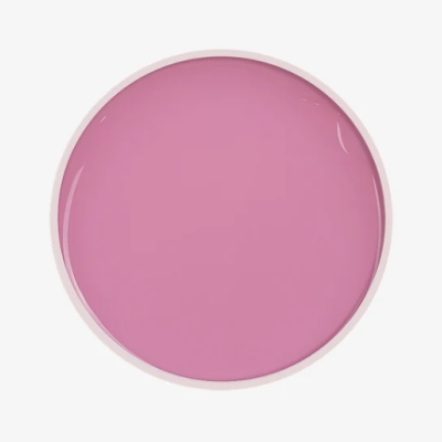 Tinta rosa num recipiente redondo