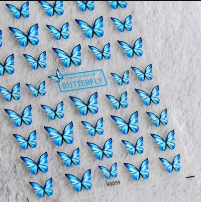 Adesivos de unha com borboletas azuis em folha transparente