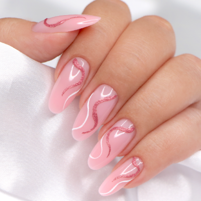 Unhas longas cor-de-rosa com desenhos ondulados em glitter rosa