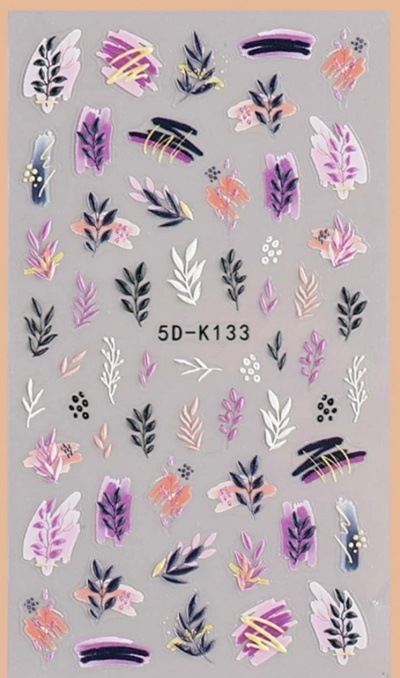 Folhas e flores decorativas coloridas numa superfície cinzenta com código 5D-K133