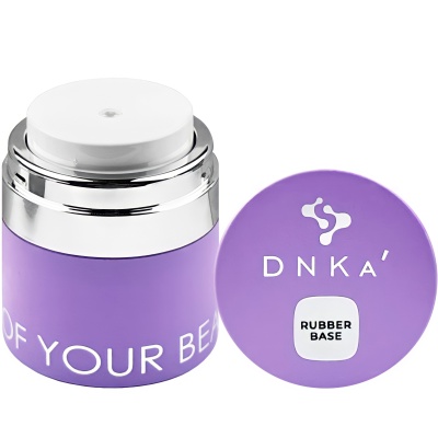Frasco roxo de cosmético com texto DNKA e RUBBER BASE