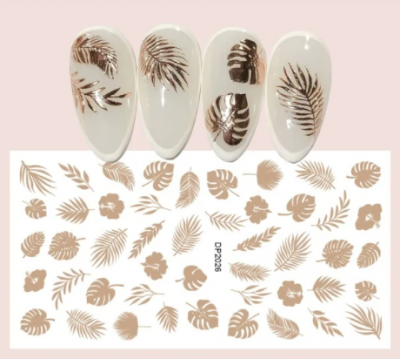 Unhas artificiais brancas com folhas douradas e cartela de autocolantes com folhas douradas