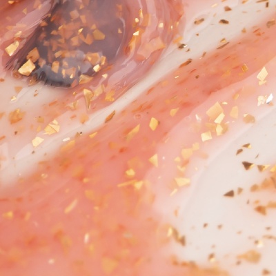 Textura translúcida rosa e branca com partículas douradas
