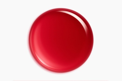 Botão redondo vermelho liso e brilhante sobre fundo branco