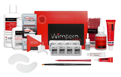 Kit de extensão de pestanas Wimpernwelle com vários produtos em embalagens vermelhas, brancas e pretas.