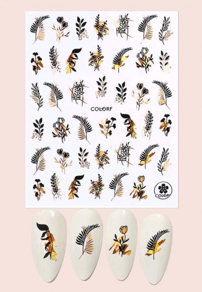 Autocolantes para unhas com desenhos de folhas e flores em preto, castanho e dourado sobre fundo branco
