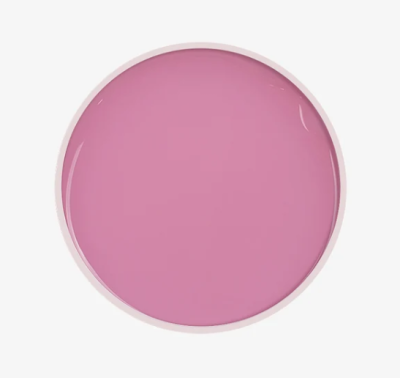 Tinta rosa num recipiente redondo