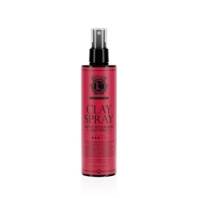 Frasco vermelho escuro de spray de cabelo com tampa preta num fundo branco