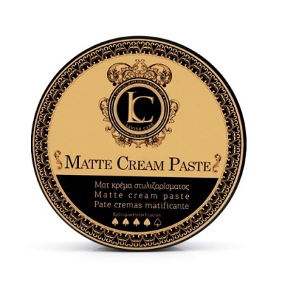 Pote redondo de pasta para cabelo matte cream paste com rótulo dourado e preto
