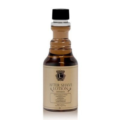 Frasco de after shave lotion Odysseus com tampa preta e rótulo creme