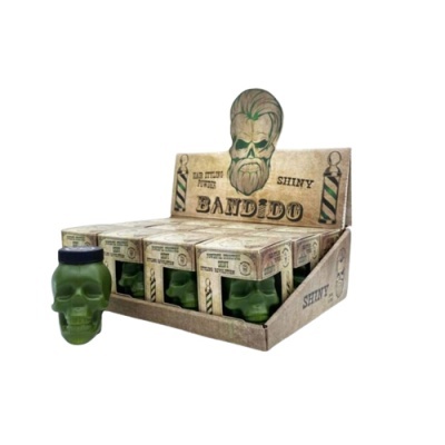 Frascos em vidro verde em forma de caveira com caixa de exposição temática