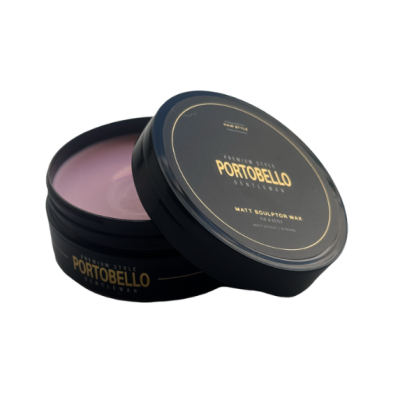 Recipiente preto com cera de modelar rosa clara e tampa preta com texto dourado