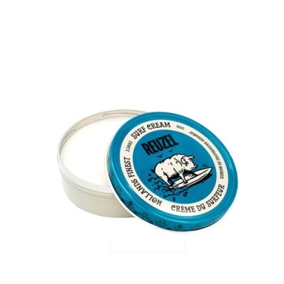 Pote aberto de creme surf REUZEL com tampa azul e porco a surfar