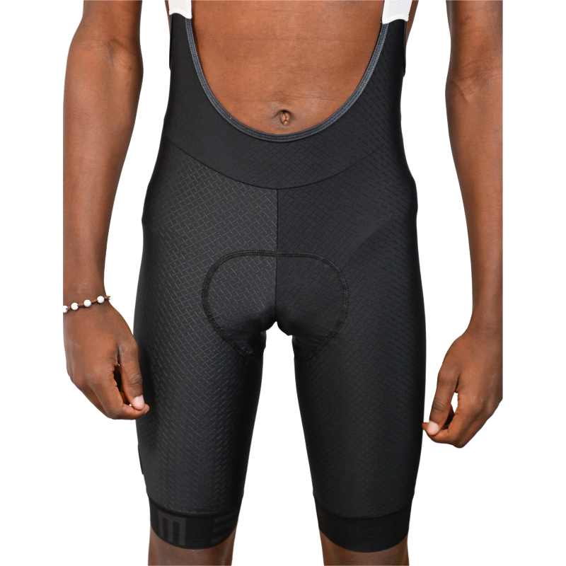 Calções ciclismo Pro Preto Calções de ciclismo pretos com alças e textura quadriculada