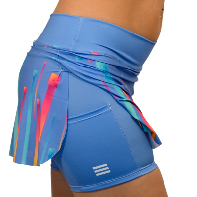Calções azuis com saia colorida abstracta e bolso lateral