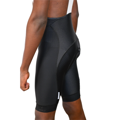 Calções de ciclismo pretos com textura quadriculada e reforço no assento.