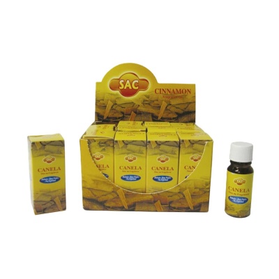 Óleo de Fragrância Canela SAC em embalagens amarelas e caixa de exposição