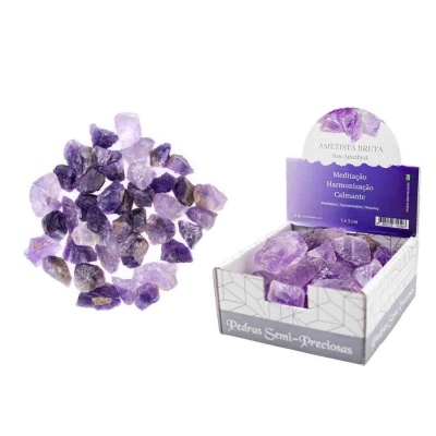 Pedras semi-preciosas de ametista bruta roxas numa caixa com rótulo lilás