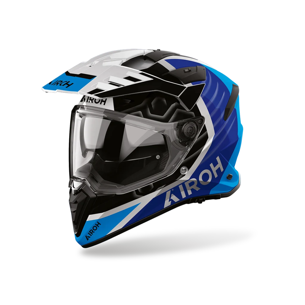 Capacete AIROH BADX-X CUBE Azul Capacete de mota azul, branco e preto com viseira e texto AIROH.